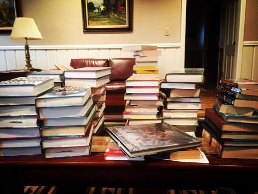 My haul, as seen from my Mom's coffee table. Don't worry. About half of those books are heading to my uncle's collection. He has the same problem I do.